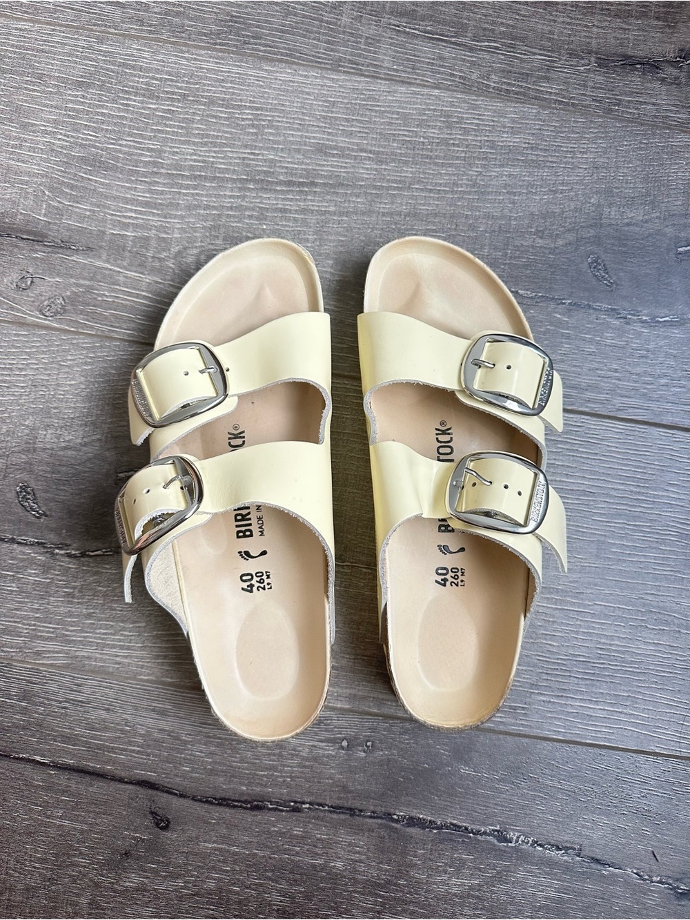 Birkenstock Arizona Sandals in Pale Yellow with Silver Big Buckles